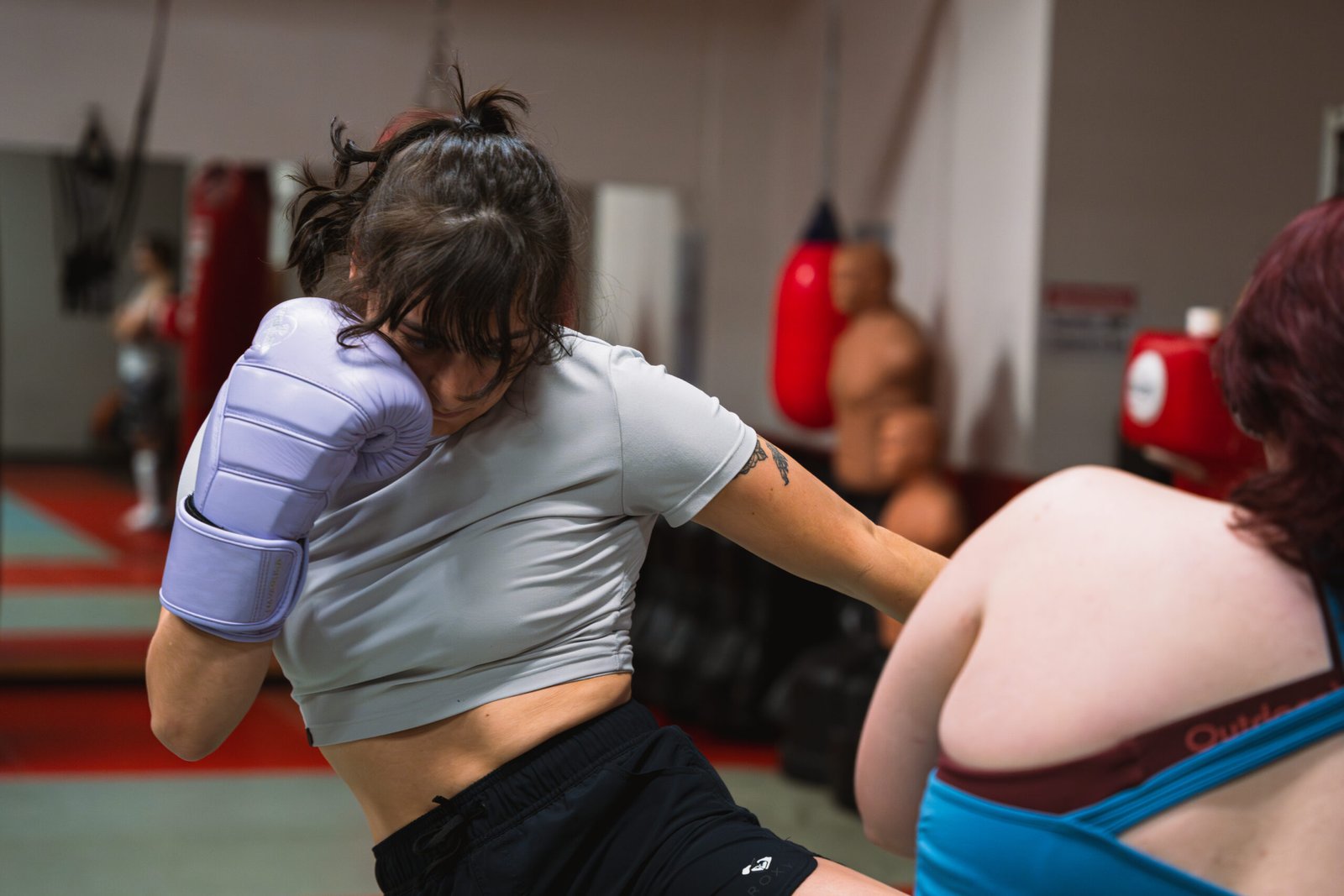 Kickboxing workout incorporating powerful kicks and knee strikes.