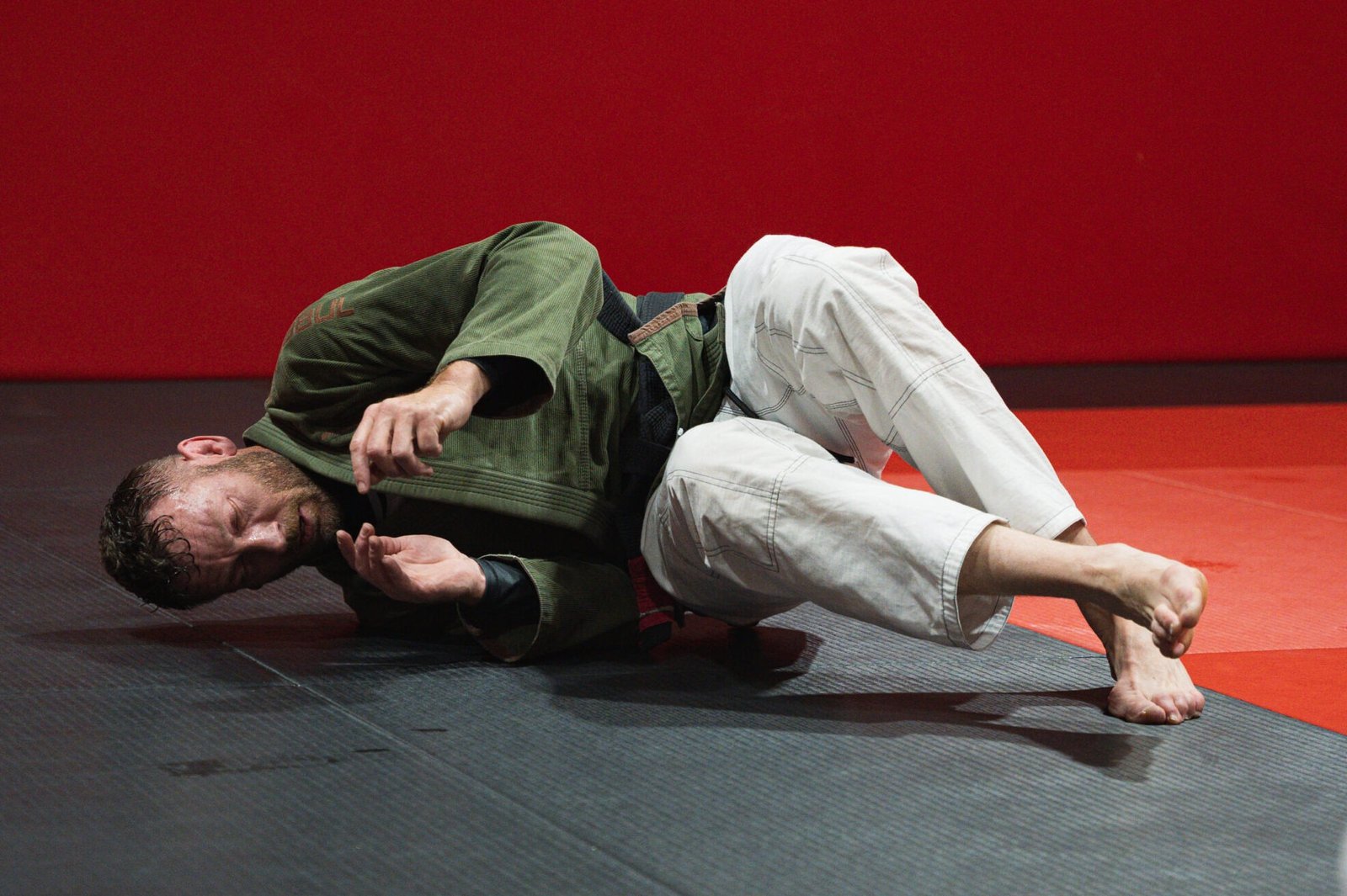 Jiu-Jitsu instructor demonstrating techniques at a fundamentals class at Excel Jiu Jitsu MMA & Fitness