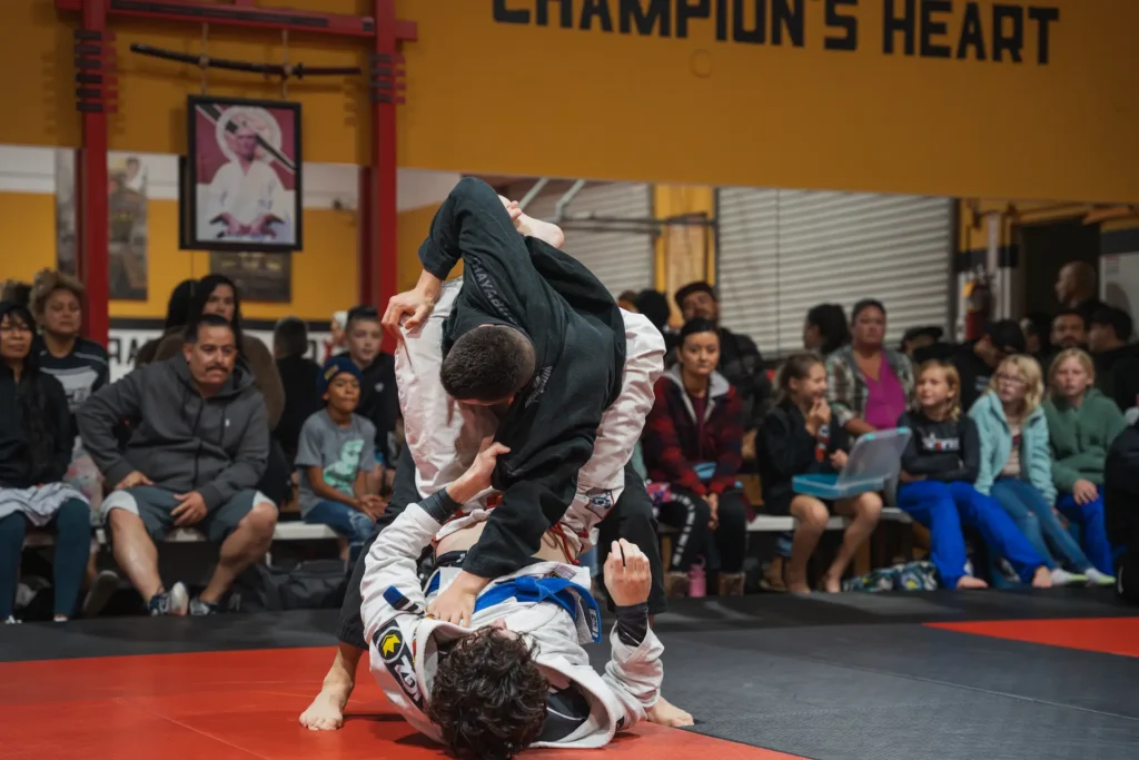 Students practicing Brazilian Jiu Jitsu at Excel Jiu Jitsu MMA & Fitness.