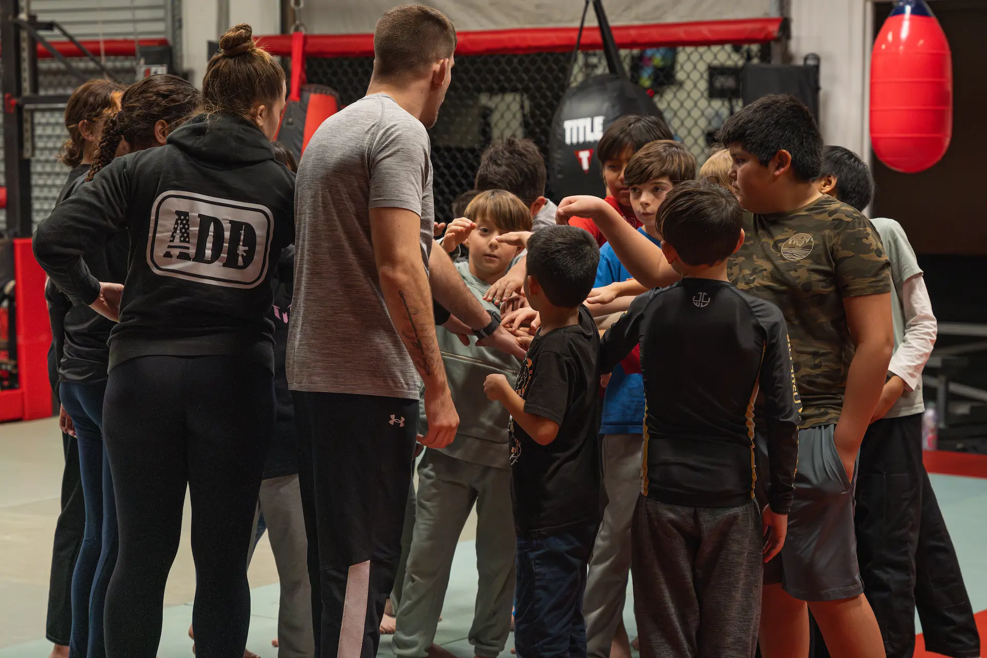 Children participating in a Kids Jiu Jitsu class at Excel Jiu Jitsu MMA & Fitness.